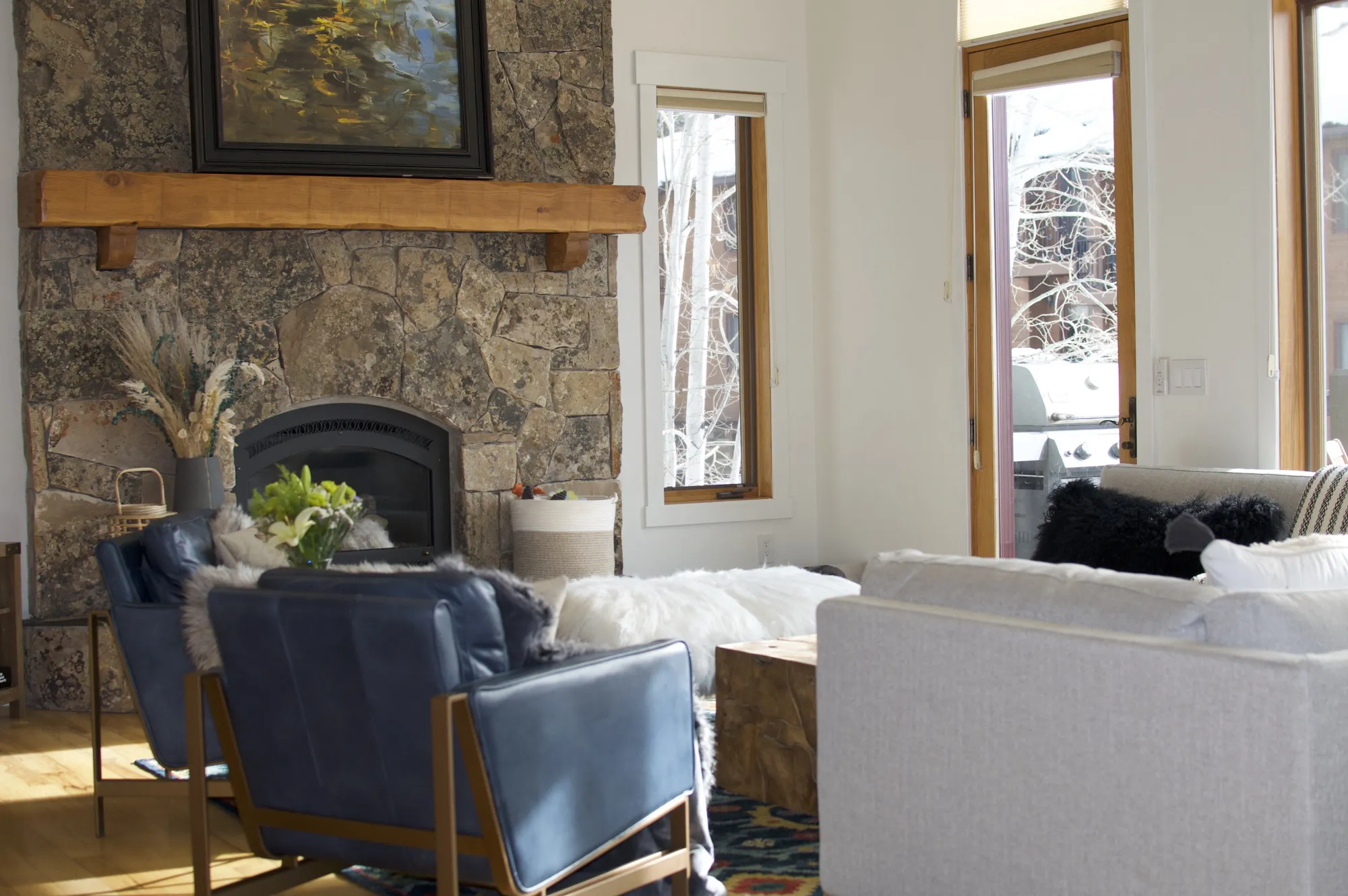 Floor-to-ceiling rock fireplace